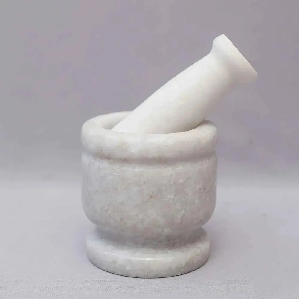 White Marble Black Mortar and Pestle
